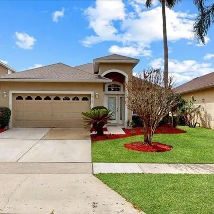 Buy this 4 bed house on 14179 Serena Lake Drive in Hunter's Creek, Orange County