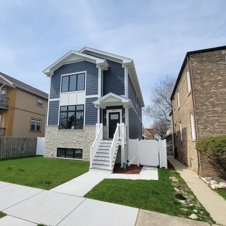 Buy this 4 bed house on 2920 North Rutherford Avenue in Chicago, IL 60634
