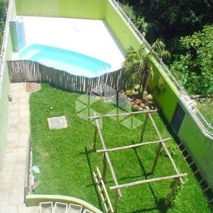 Buy this 3 bed house on Rua Osmar Amaro de Freitas in Jardim Sabará, Porto Alegre - RS