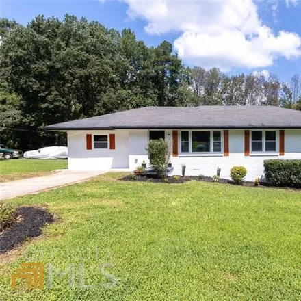 Buy this 3 bed house on 1916 Creekside Court in Candler-McAfee, GA 30032