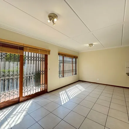 Rent this 2 bed townhouse on Isipingo Road in Paulshof, Sandton