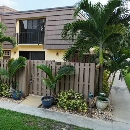 Rent this 2 bed townhouse on Palm Beach Gardens Medical Center in 3360 Burns Road, North Palm Beach