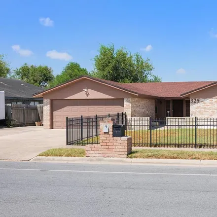 Buy this 3 bed house on 325 Rancho Viejo Boulevard in Brownsville, TX 78526