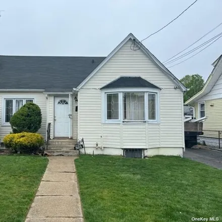 Buy this 4 bed house on 325 Pennsylvania Avenue in Roosevelt, NY 11575