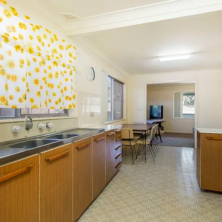 Rent this 3 bed apartment on Crescent Head Public School in Pacific Street, Crescent Head NSW 2440