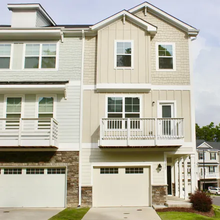 Rent this 4 bed townhouse on 1025 Diamond Dove Lane in Apex, NC 27502