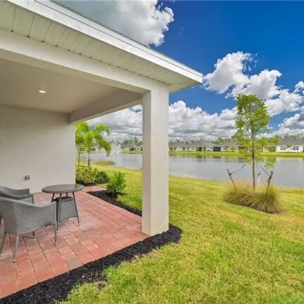 Image 2 - unnamed road, Herons Glen Golf and Country Club, Lee County, FL, USA - House for sale