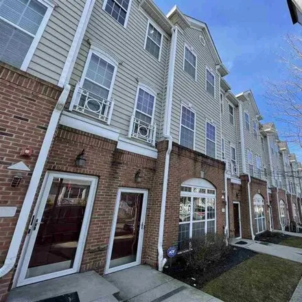 Rent this 2 bed townhouse on 385 Custer Avenue in Greenville, Jersey City