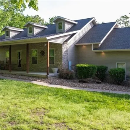 Buy this 4 bed house on 144 Claremont Ridge in Camden County, MO 65020
