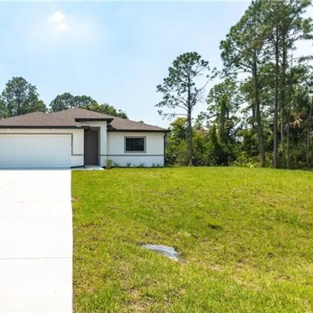 Buy this 3 bed house on 3856 Sunset Road in Lehigh Acres, FL 33971