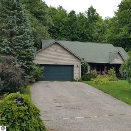 Buy this 5 bed house on 7801 East Woodside Court in Bingham Township, MI 49684