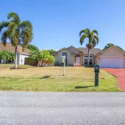 Buy this 3 bed house on 1265 Southwest Fletcher Lane in Port Saint Lucie, FL 34953