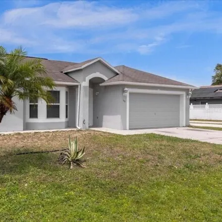 Buy this 4 bed house on 447 Martigues Drive in Poinciana, FL 34759