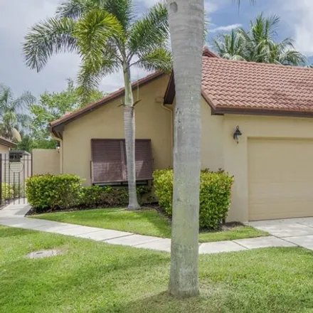 Rent this 3 bed house on 93 North Ironwood Way in Palm Beach Gardens, FL 33418