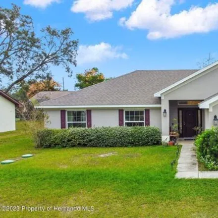 Buy this 4 bed house on 3318 Harrow Road in Spring Hill, FL 34606