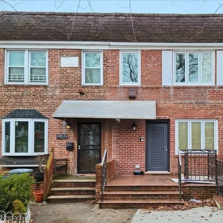 Buy this 4 bed townhouse on 144-04 68th Drive in New York, NY 11367