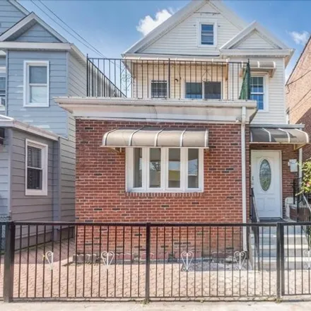 Buy this 6 bed house on 1174 East 95th Street in New York, NY 11236