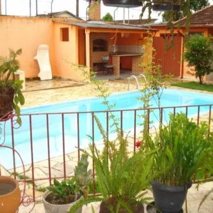 Buy this 4 bed house on Fan Motos in Avenida Sete de Janeiro, Jardim Santana