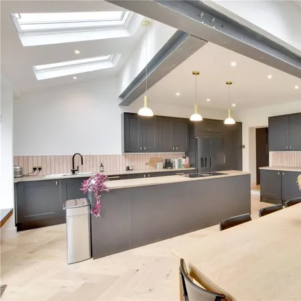 Rent this 3 bed townhouse on Top Chef Cafe in 105 Manor Lane, London