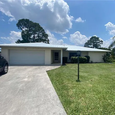 Rent this 3 bed house on 2481 Southeast Sistina Street in Port Saint Lucie, FL 34952
