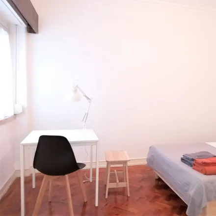 Rent this 3 bed room on Rua de Arroios 85 in 1150-056 Lisbon, Portugal