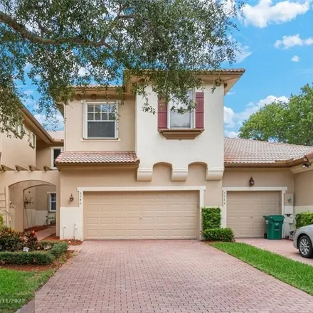 Rent this 3 bed house on 5740 Northwest 120th Avenue in Heron Bay South, Coral Springs