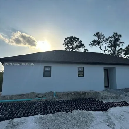 Buy this 3 bed house on 636 Eisenhower Blvd in Lehigh Acres, Florida