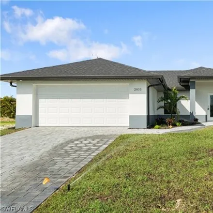 Buy this 4 bed house on 2061 Northeast 25th Street in Cape Coral, FL 33909