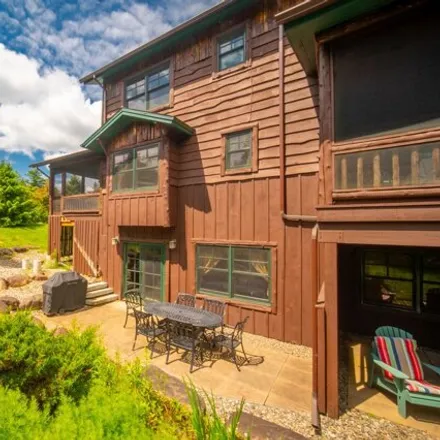 Buy this 4 bed condo on 4 Rustic Way in Village of Lake Placid, North Elba