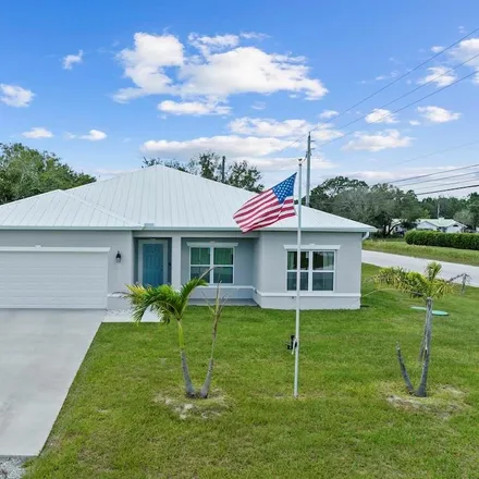 Buy this 4 bed house on 8291 99th Avenue in Vero Lake Estates, Indian River County