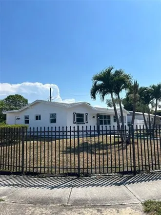 Buy this 4 bed house on 3200 Nw 211th St in Miami Gardens, Florida