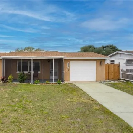 Buy this 3 bed house on 3536 Colonial Hills Drive in Elfers, FL 34652