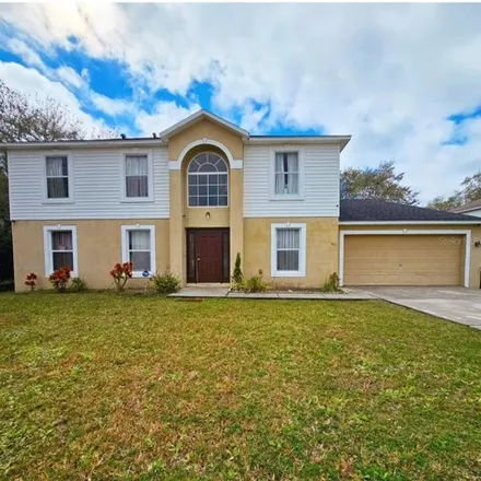 Buy this 4 bed house on 491 Dove Drive in Polk County, FL 34759