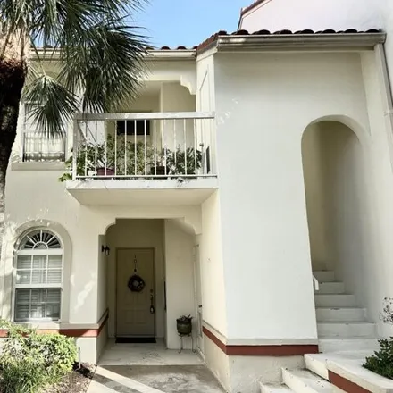 Rent this 2 bed condo on Cypress Point Drive in Palm Beach Gardens, FL 33418