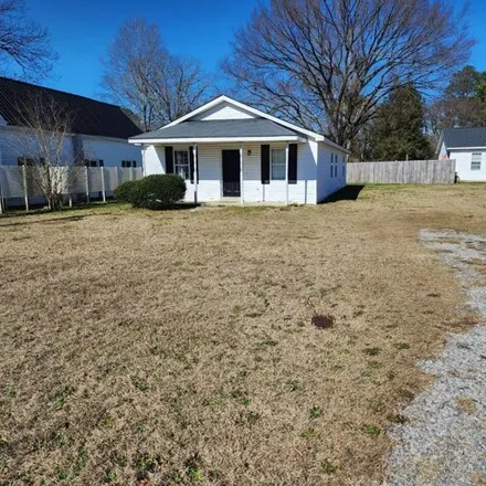 Buy this 4 bed house on 455 East North Railroad Street in Four Oaks, Johnston County