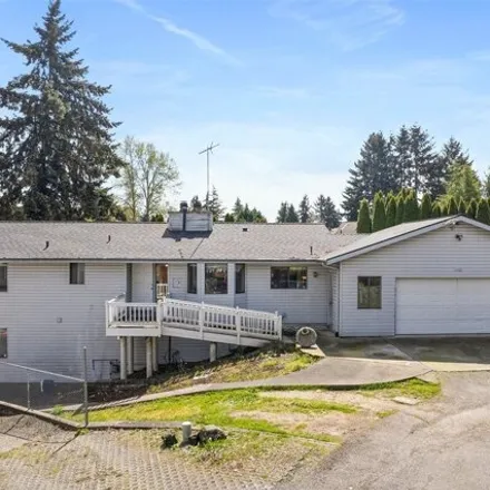 Buy this 5 bed house on 11902 Southeast 209th Place in Kent, WA 98031