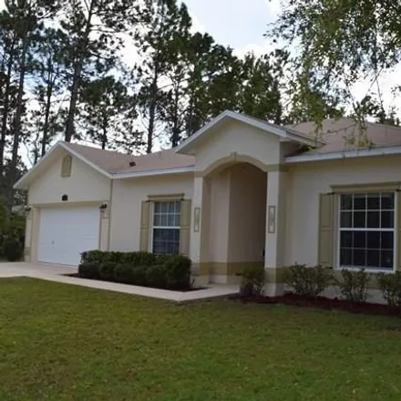 Rent this 4 bed house on 26 Poplar Drive in Palm Coast, FL 32164
