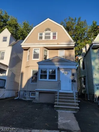 Rent this 3 bed townhouse on 125 North 16th Street in Ampere, East Orange
