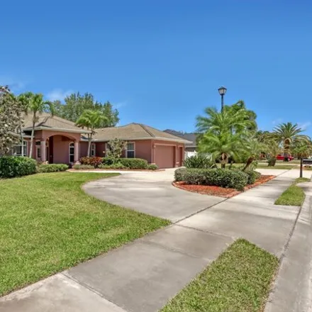 Buy this 4 bed house on 2658 Canary Isles Drive in Melbourne, FL 32901