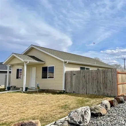 Buy this 3 bed house on 1163 East Adams Street in Powell, WY 82435