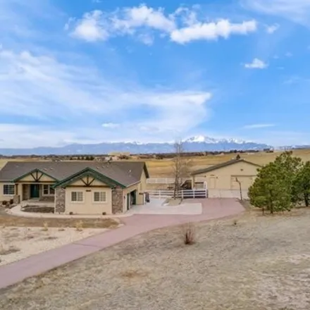 Buy this 5 bed house on 11952 West Conestoga Trail in El Paso County, CO 80106