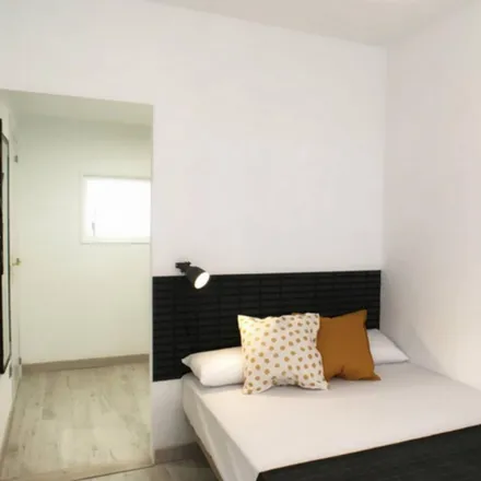 Rent this 5 bed room on Calle Hachero in 22, 28053 Madrid