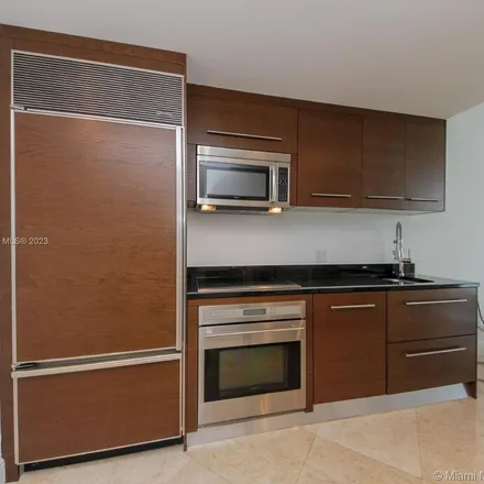 Rent this 1 bed apartment on Brickell Avenue & Southeast 5th Street in Brickell Avenue, Torch of Friendship