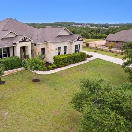 Buy this 4 bed house on 1507 Bearkat Canyon Drive in Dripping Springs, TX 78620