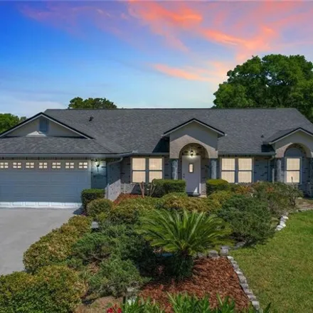 Buy this 4 bed house on 1720 Queen Palm Drive in Orange County, FL 32712