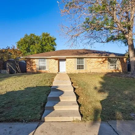 Rent this 4 bed house on 642 Reno Street in Lewisville, TX 75077