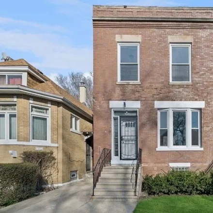 Buy this 4 bed house on 7447 South Ellis Avenue in Chicago, IL 60619