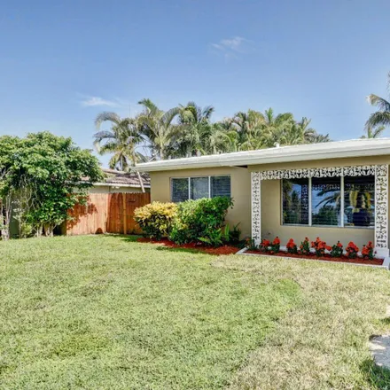 Rent this 3 bed house on 396 Northeast 29th Street in Blue Inlet, Boca Raton