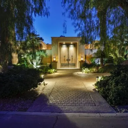Buy this 4 bed house on Arnold Palmer Course in South Racquet Club Drive, Rancho Mirage