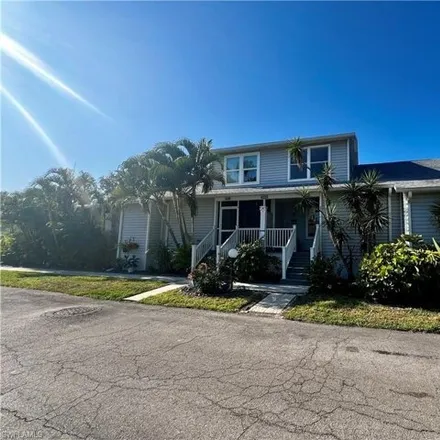 Buy this 3 bed townhouse on 6040 Timberwood Circle in Lee County, FL 33908